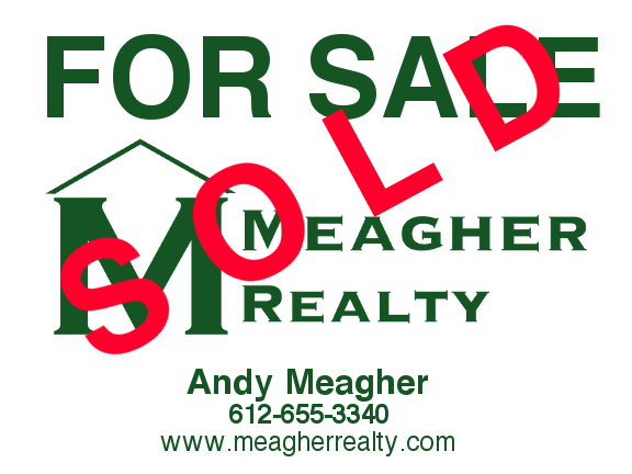 Sold sign in front yard